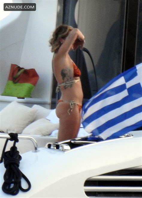 Rita Ora Seen In A Tiger Print Bikini Whilst On A Yacht In Corfu AZNude