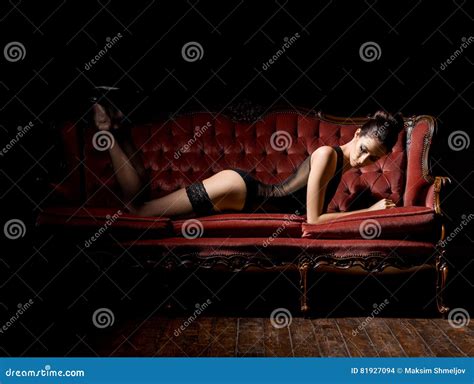 Woman In Lingerie Sitting On A Vintage Sofa Stock Photo Image Of Haircut Face 81927094