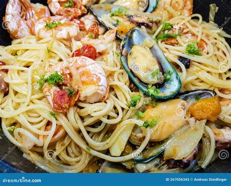 Italian seafood pasta stock image. Image of prawns, octopus - 267056343