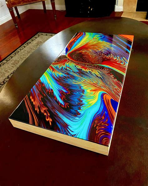 A finished resin acrylic pour made on wood : r/interestingasfuck