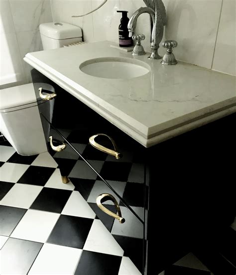 Ultra Chic Black Vanity Unit Topped With Marble And Chrome Swan Tap