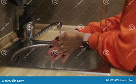 Unrecognizable Woman Washing Hands In Washbasin Unknown Female Washing