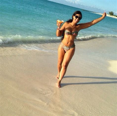 Ashanti Flaunts Her Bikini Body At The Beach