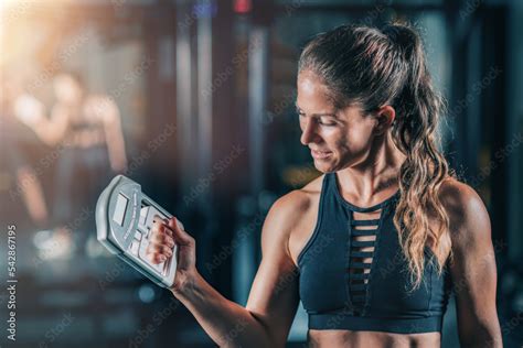 Using Hand Dynamometer for Grip Strength Test Stock Photo | Adobe Stock