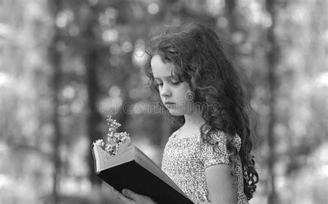 Black and White Portrait of a Child Reading a Book Stock Photo - Image ...