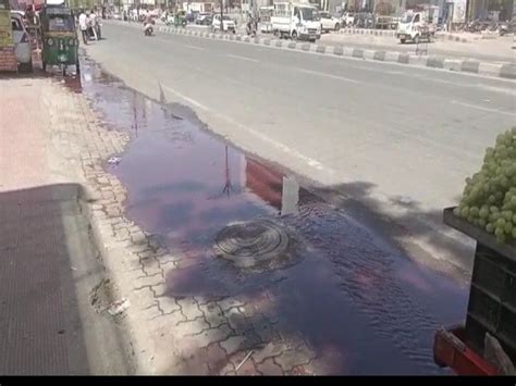 Sewerage Lines Overflow Colored Water Spills On The Roads Going