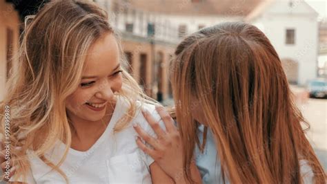 Two Young Beautiful Blond Smiling Hipster Girls In Trendy Summer Clothes Sexy Carefree Women