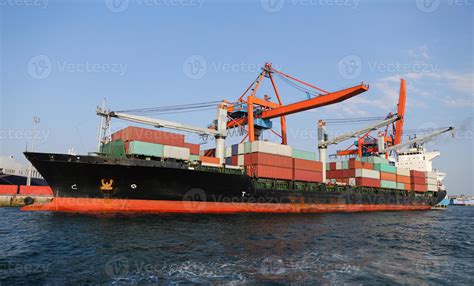 Container Ship in port 10296475 Stock Photo at Vecteezy