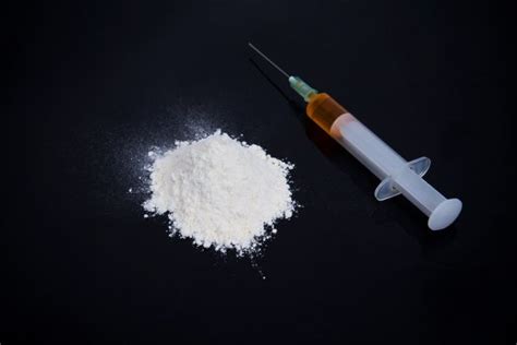 Cocaine powder in lines — Stock Photo © GeniusKp #42804635