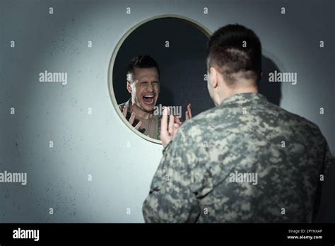 Angry Military Veteran Screaming Near Mirror While Suffering Post