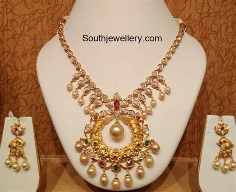 Antique Gold Mango Necklace With Peacock Pendant Indian Jewellery Designs