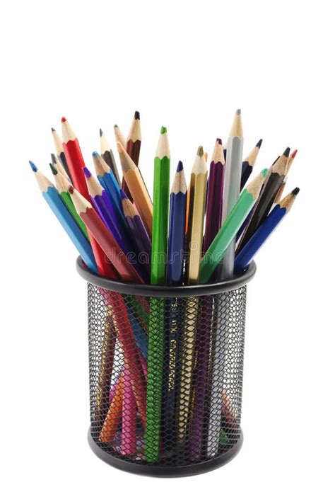 Various Colored Pencils Standing In Grilled Pencil Cup Stock Image