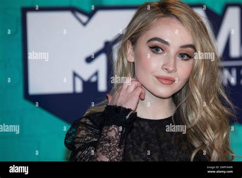 Sabrina Carpenter Poses For Photographers Upon Arrival At The Mtv European Music Awards 2017 In