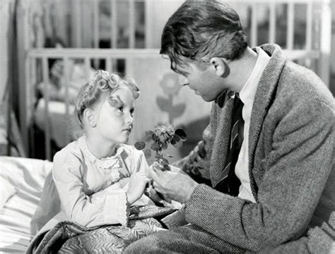 Actress Karolyn Grimes As Zuzu Bailey With Jimmy Stewart As George