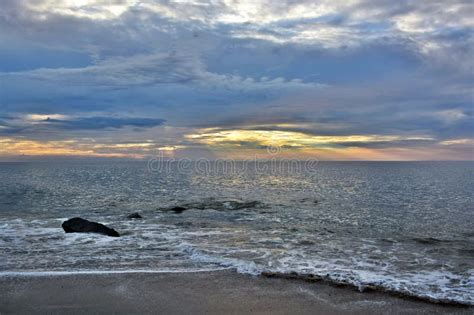 Summer Sunrise At The Shore Over Rock Jetty Stock Photo Image Of