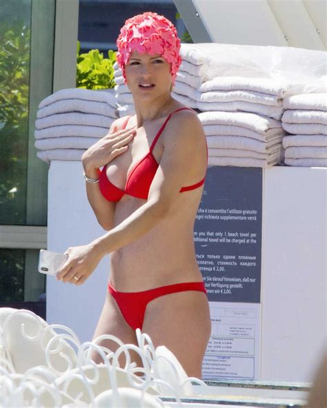 Michelle Hunziker Wears A Red Bikini By The Pool In Milano Marittima