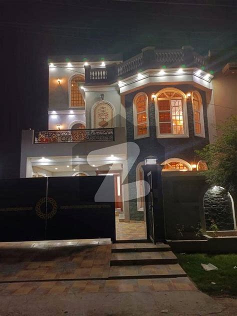 10 MARLA BRAND NEW DESIGNER HOUSE FOR SALE IN NASHEMAN IQBAL Nasheman E