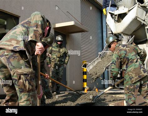 Us Navy Seabees Assigned To Naval Mobile Construction Battalion Four