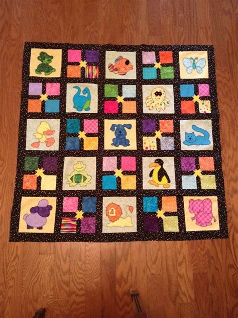 Animal Baby Quilt | Quilts, Animal baby quilt, Baby quilts