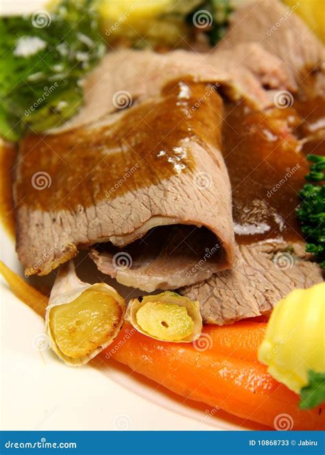 Roast Lamb and Garlic stock image. Image of gravy, mint - 10868733