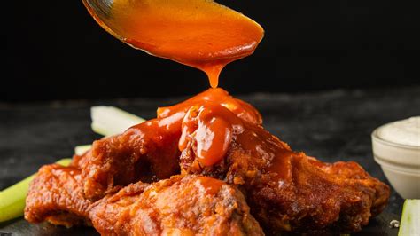 The Quick Method To Evenly Coat Wings In Sauce