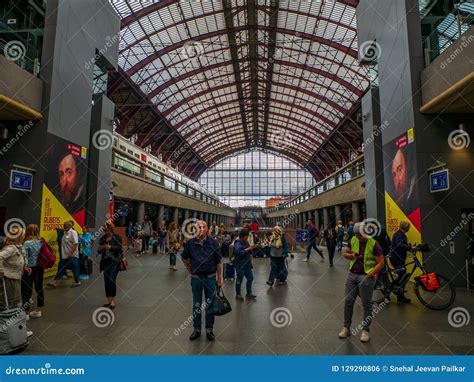 Interior of the Central Train Station of Antwerp with Passengers ...