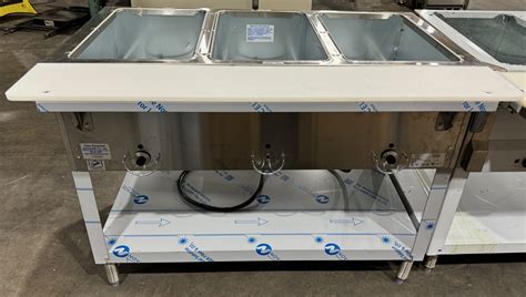 DUKE E HOT FOOD TABLE W WELLS AND CUTTING BOARD Vision Equipment