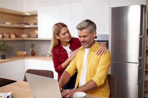 Mature Couple Using Laptop Together Husband And Wife Computer Social Network Stock Image