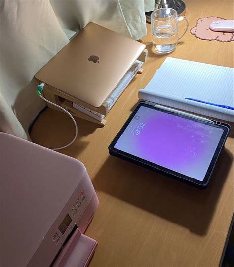 An Apple Ipad Is Sitting On A Table