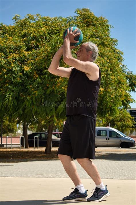 Mature Man Training Street Basketball With Metal Basket Stock Image Image Of Park Mature