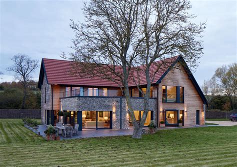 Modernes Landhaus LLOYD WEBBER Mit Satteldach Baufritz HausbauDirekt De