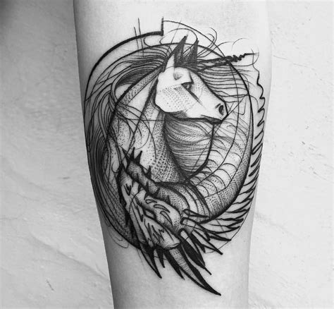 Little black ink forearm tattoo of unicorn with dragon - Tattooimages.biz