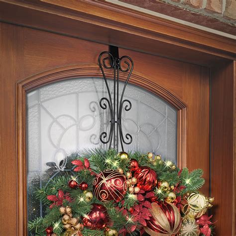 The Over The Door Wreath Hanger - Hammacher Schlemmer