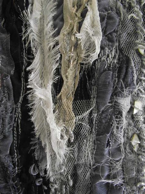 Distressed Textiles Design With Stitch Detail Mixed Fabric Layers And