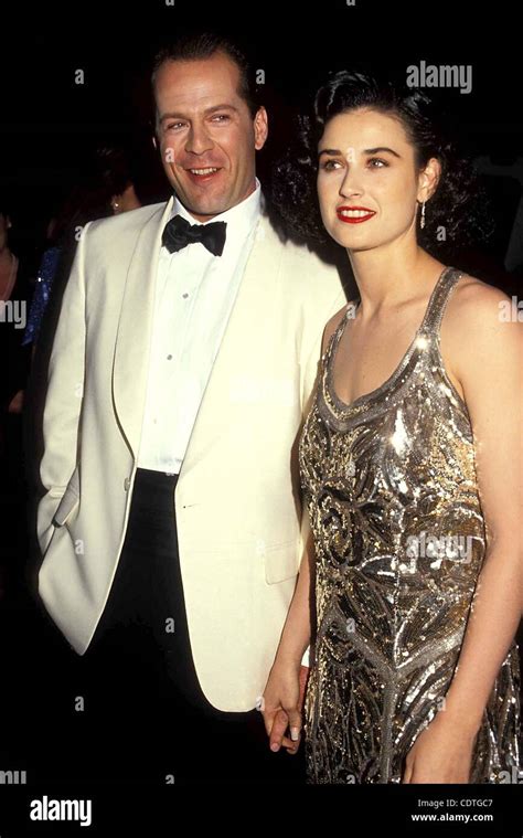 Demi moore bruce willis 1990 hi-res stock photography and images - Alamy