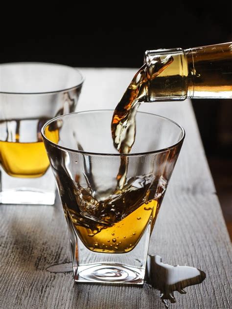 Whisky Being Poured In A Glass Stock Photo Image Of Bottle Cocktail