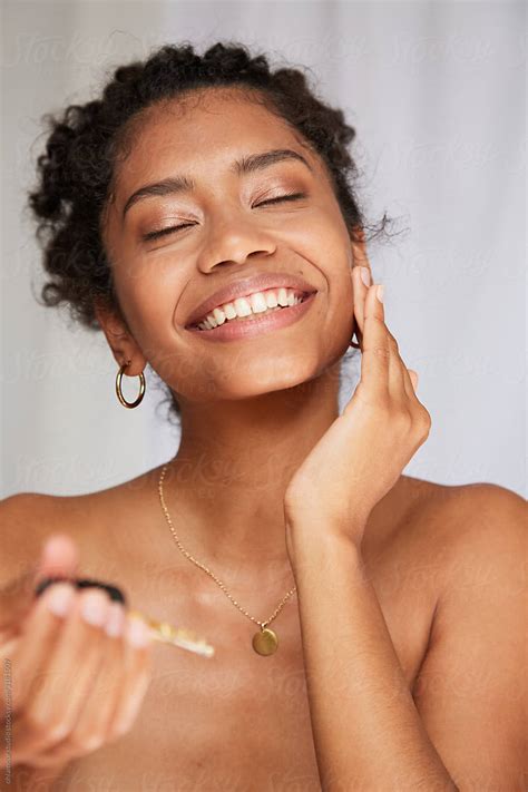 Woman Enjoying Beauty Treatment By Stocksy Contributor Ohlamour