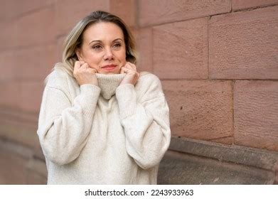 Attractive Blonde Middle Aged Woman Smiling Stock Photo 2243933963 Shutterstock