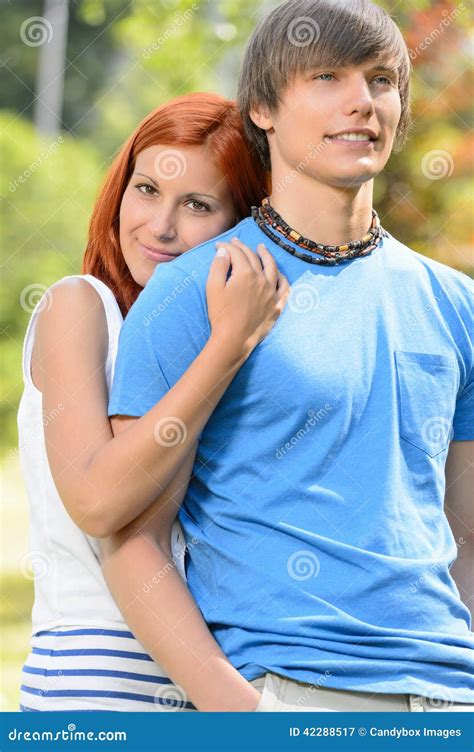 Teenage Girlfriend Hugging Her Boyfriend In Park Stock Image Image Of Love Romantic 42288517