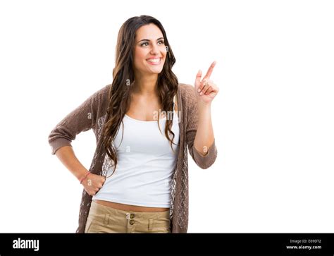 Beautiful Brunette Woman Laughing And Pointing To The Left Isolated Over White Background Stock