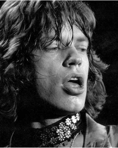 Mick Jagger Young Pictures - Mick Jagger smiles ....