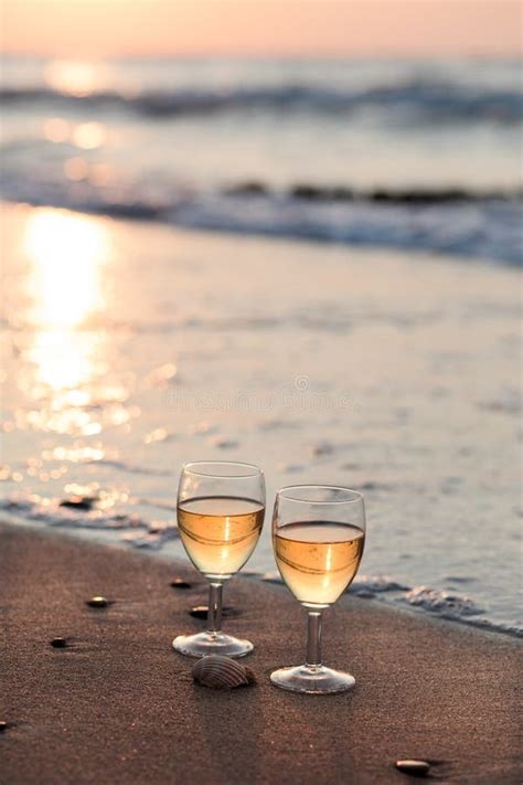 Two Wine Glasses Grapes Wicker Basket On Beach Stock Image Image Of