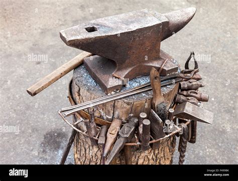 Old Anvil With Blacksmith Tools On The Outdoors Stock Photo Alamy