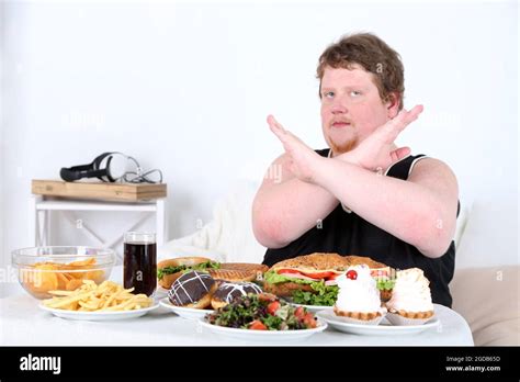 Fat Man Do Not Want To Eat A Lot Of Unhealthy Food On Home Interior