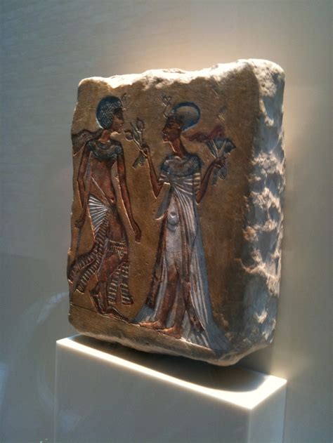 Akhenaten and Nefertiti, or possibly Smenkhkare and Meritaten.