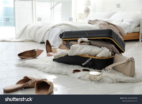 Open Suitcase Full Clothes Shoes Fashionable Stock Photo 2063429549