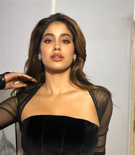 janhvi kapoor stuns  mesmerizing black body hugging deep neck ensemble