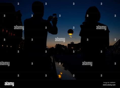 Paris France Th Aug The Olympic Cauldron Hangs Under A Hot Air Balloon Is Seen During