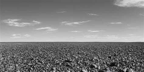 A Completely Barren And Desolate Land Stretches Out Stable Diffusion