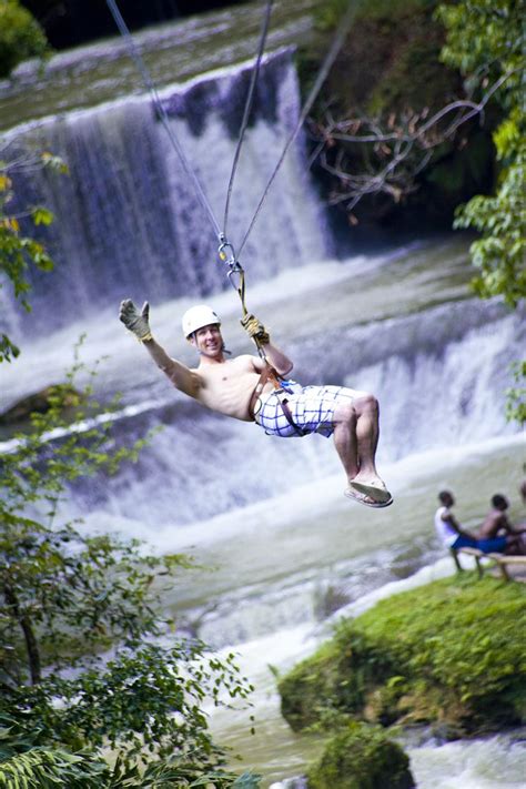 Enjoying zipline canopy at YS Falls | Fun outdoor activities, Adventure ...